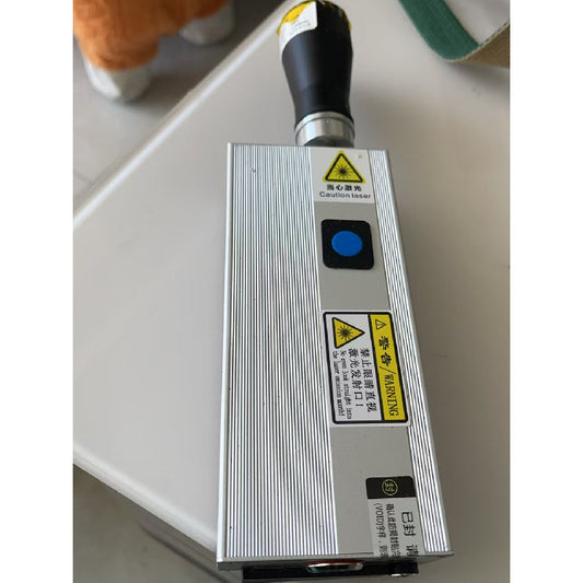 Pump source handheld laser transmitter